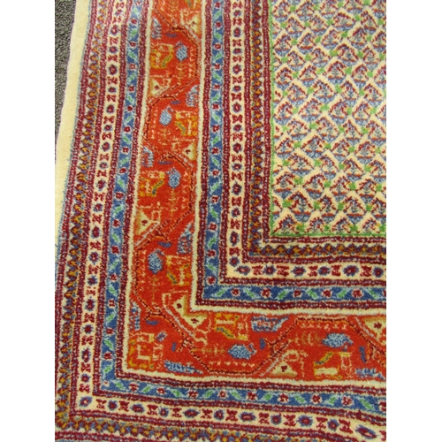 1675 - Persian Rug with intricate boteh design surrounded by multiple borders in vibrant tones of blue, cre... 