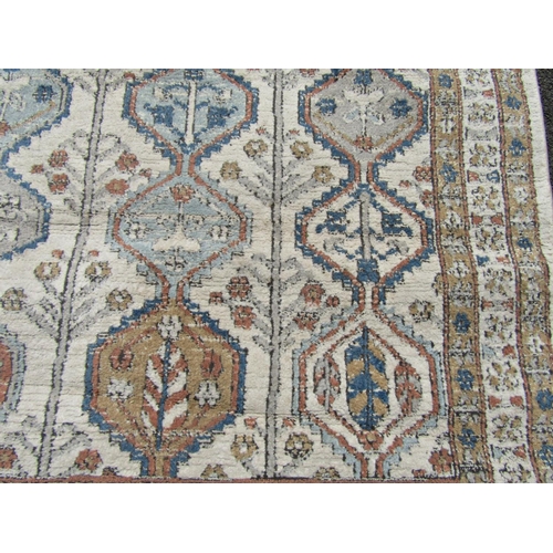 1676 - A Kazak Style Rug with four central columns in cool neutral tones 210 x 165 cm