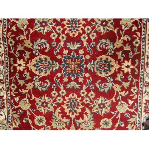 1682 - A Small Persian Sultanabad Style Runner with floral sprays on a red ground, 250 x 82 cm