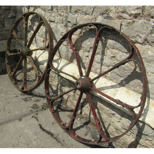 2056 - A pair of antique iron eight spoke implement wheels, 92cm (3ft) diameter (af)