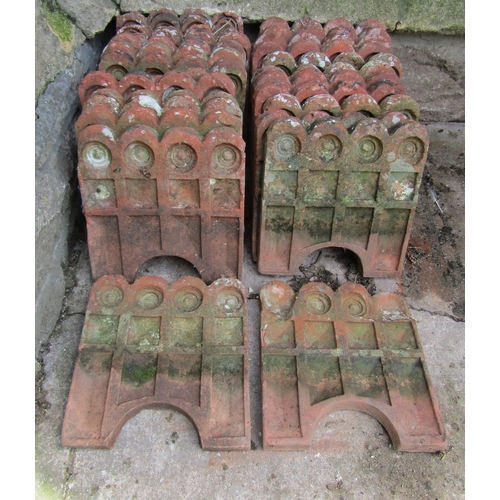 2059 - Twenty two weathered terracotta garden edging tiles (af some damaged)