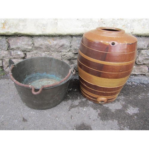 2072 - A vintage salt glazed stoneware barrel, 44cm high, together with a 19th century heavy brass or possi... 