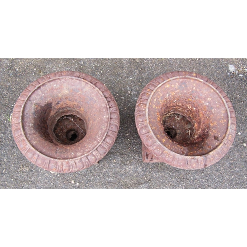 2090 - A pair of small vintage weathered cast iron campana shaped urns with flared egg and dart rims, 23cm ... 