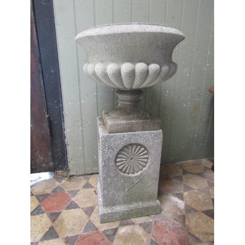 2095 - A nicely weathered cast composition stone garden urn, the circular lobed bowl with flared rim, raise... 