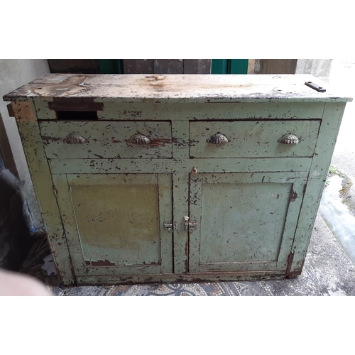 2118 - An antique rustic painted pine kitchen dresser enclosed by a pair of panelled doors beneath two frie... 