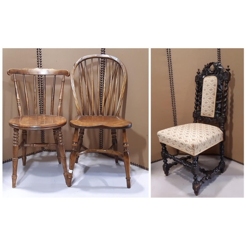 2141 - A good quality Windsor hoop and stick back dining  chair with saddle shaped seat raised on turned su... 