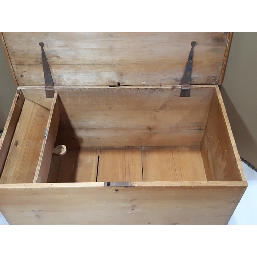 2145 - A 19th century stripped and waxed pine blanket box with hinged lid, exposed dovetail construction an... 