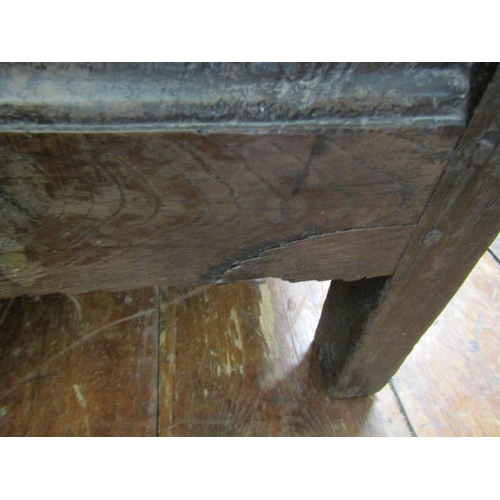 2595A - An 18th century oak panelled coffer with plank top