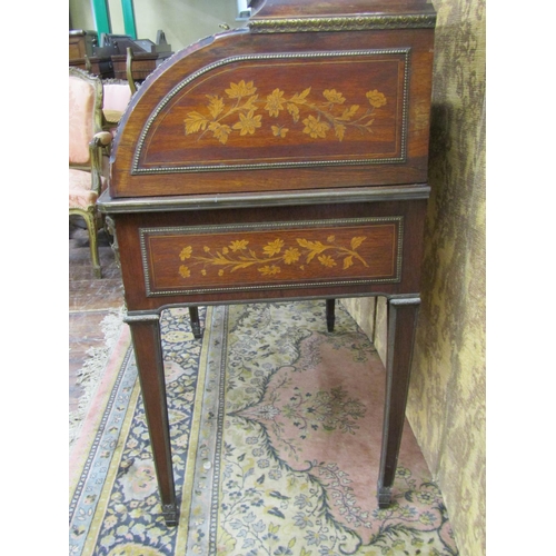 2611 - A good quality 19th century French cylinder top bureau in rosewood with cornucopia, floral and lands... 