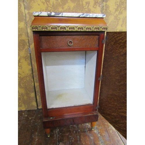 2612 - A French Amboyna wood side cupboard with further marquetry and applied brasswork detail set beneath ... 