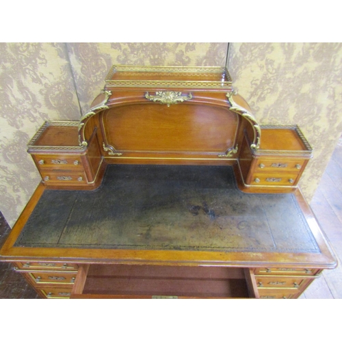 2613 - 19th century continental kneehole writing desk fitted with eleven graduated drawers with shaped gree... 