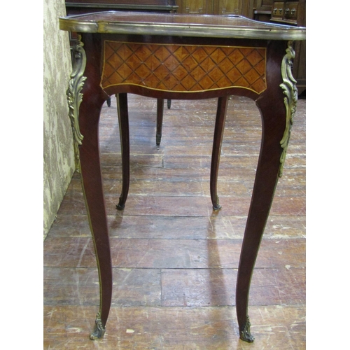 2615 - A French occasional table with parquetry inlaid detail, a frieze drawer, raised on shaped supports w... 