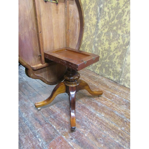 2622 - A Victorian walnut and figured walnut loo table with quarter veneered top, shaped outline and raised... 