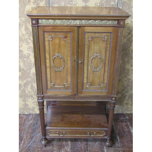 2631 - 19th century French mahogany cabinet on stand enclosed by a pair of panelled doors over an open fram... 