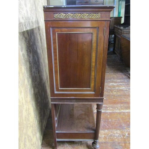 2631 - 19th century French mahogany cabinet on stand enclosed by a pair of panelled doors over an open fram... 