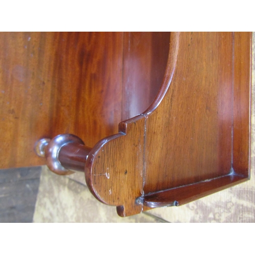 2635 - A Regency mahogany davenport of unusual form, the fold over top revealing a writing surface and thre... 