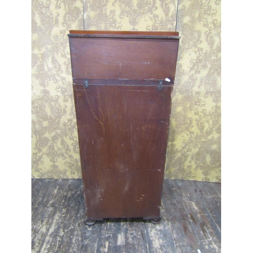 2635 - A Regency mahogany davenport of unusual form, the fold over top revealing a writing surface and thre... 