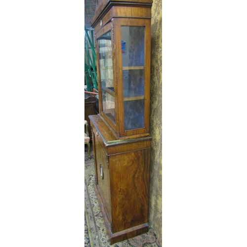 2636 - A matched pair of 19th century French walnut pier cabinets, the lower section enclosed by panelled d... 