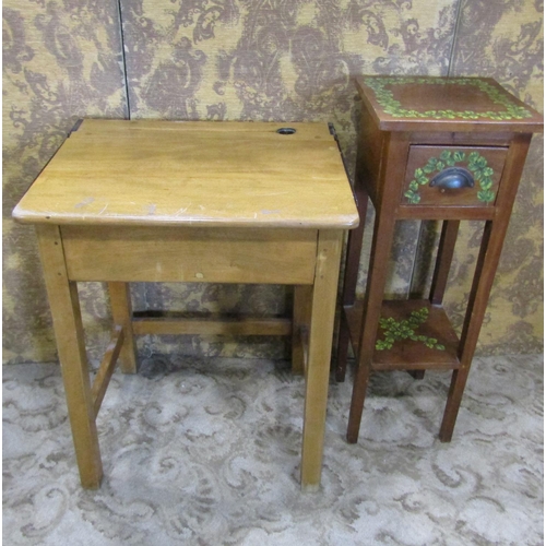 2124 - A vintage stained beechwood child's school desk with hinged lid and ink well, 57 cm wide x 46 cm dee... 