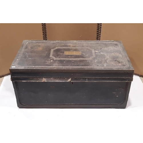 2157 - A Georgian leather overlaid and studded camphor wood trunk with hinged lid and drop side carrying ha... 