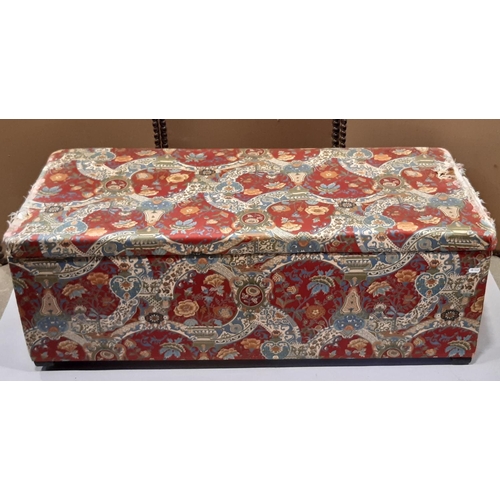 2159 - An upholstered box ottoman of rectangular form with hinged lid, 107 cm long x 48 cm wide x 37 cm hig... 