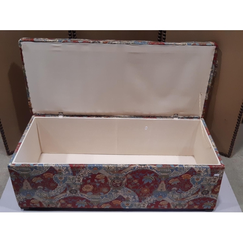 2159 - An upholstered box ottoman of rectangular form with hinged lid, 107 cm long x 48 cm wide x 37 cm hig... 