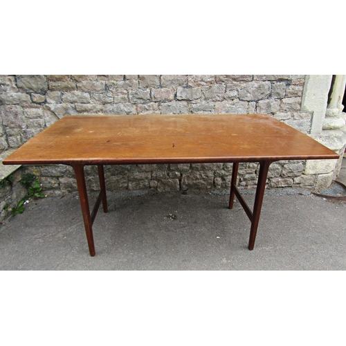 2188 - A mid 20th century teak single drop leaf dining table raised on tapered and moulded legs partially u... 