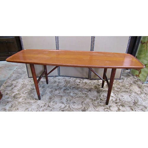 2194 - A vintage retro teak occasional table of rectangular form with shaped and moulded outline raised on ... 