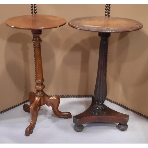 2196 - A Victorian mixed wood occasional table with circular top raised on a reeded vase shaped pillar, tri... 