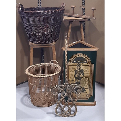 2219 - A vintage elm and beechwood stool with saddle shaped seat, together with a bamboo two tier plant sta... 