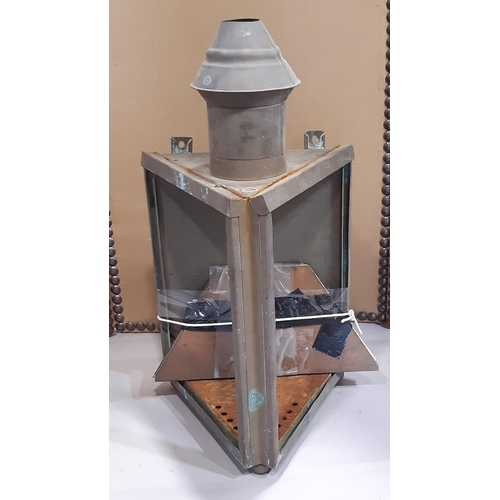 2247 - A 19th century copper wall lantern with triangular shaped frame and chimney