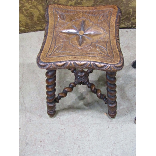 2204 - A Victorian carved oak stool raised on splayed spiral twist supports and stretcher, 46cm high, toget... 