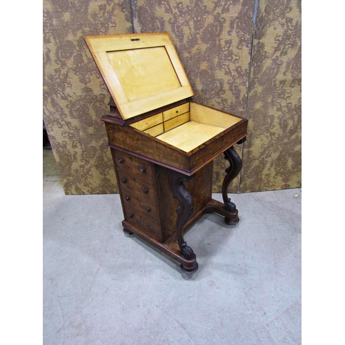 2208 - A Victorian walnut and figured walnut davenport with inlaid detail, maple lined interior and fitted ... 