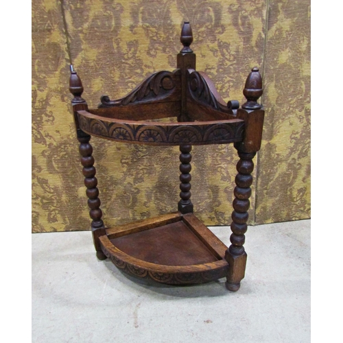 2213 - A Victorian carved oak corner umbrella/stick stand with turned bobbin supports and acorn finials, 60... 