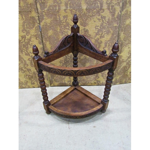 2213 - A Victorian carved oak corner umbrella/stick stand with turned bobbin supports and acorn finials, 60... 