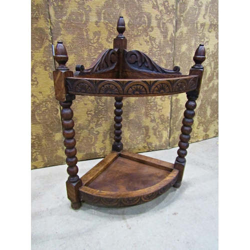 2213 - A Victorian carved oak corner umbrella/stick stand with turned bobbin supports and acorn finials, 60... 