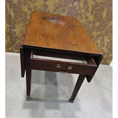 2215 - A 19th century mahogany Pembroke table with frieze drawer and shaped apron, raised on square tapered... 