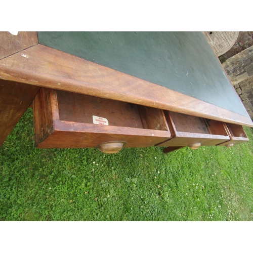 2233 - A mahogany writing desk with inset leather top, with three drawers on square taper legs, 152cm long