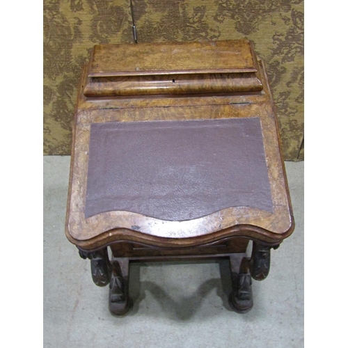 2237 - A Victorian walnut and figured walnut davenport of usual form with cabriole supports and simply fitt... 