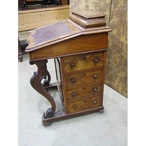 2237 - A Victorian walnut and figured walnut davenport of usual form with cabriole supports and simply fitt... 