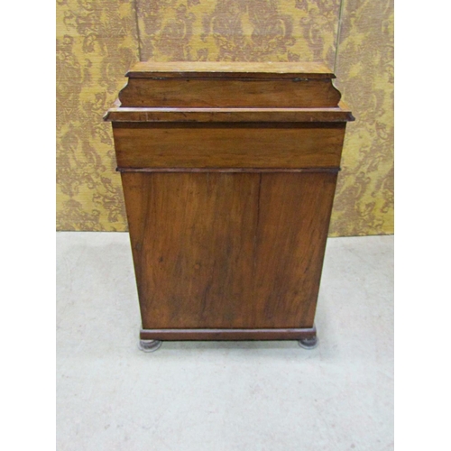 2237 - A Victorian walnut and figured walnut davenport of usual form with cabriole supports and simply fitt... 