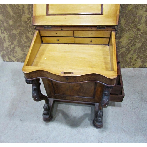 2237 - A Victorian walnut and figured walnut davenport of usual form with cabriole supports and simply fitt... 