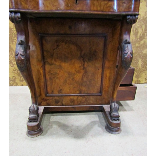 2237 - A Victorian walnut and figured walnut davenport of usual form with cabriole supports and simply fitt... 