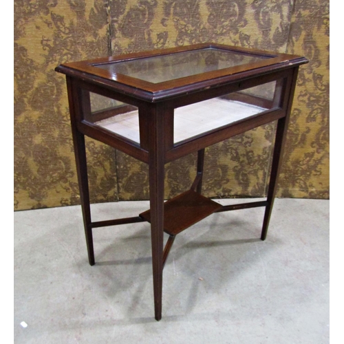 2258 - An inlaid Edwardian mahogany vitrine with cross banded detail on square tapered legs with under gall... 