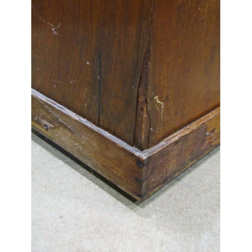 2259 - A Victorian oak pedestal writing desk of nine drawers with inset top, 122cm wide