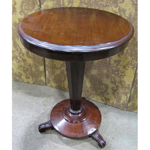 2285 - A Victorian mahogany occasional table, the circular top on an inverted octagonal stem and platform b... 