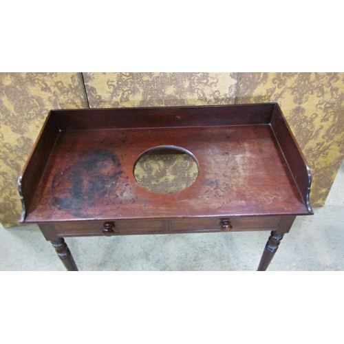 2288 - A Victorian mahogany washstand with three quarter gallery, two demi drawers on turned supports, 105 ... 