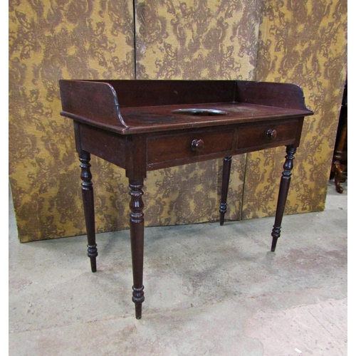 2288 - A Victorian mahogany washstand with three quarter gallery, two demi drawers on turned supports, 105 ... 