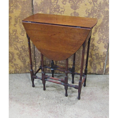 2295 - An Edwardian mahogany spider leg occasional table together with dressing tool with shaped supports a... 