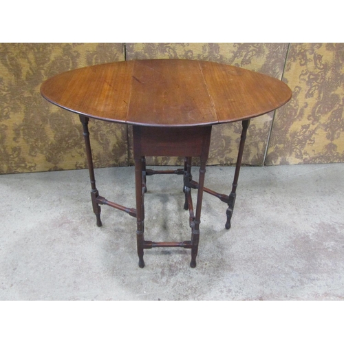 2295 - An Edwardian mahogany spider leg occasional table together with dressing tool with shaped supports a... 